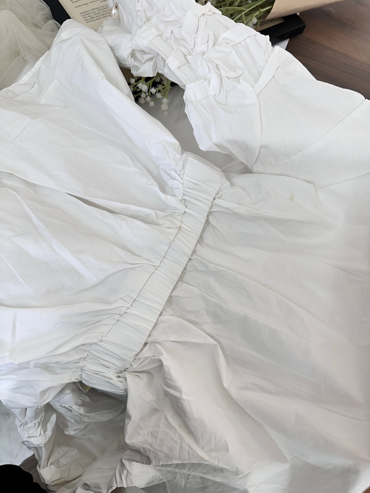 White cinched waist top