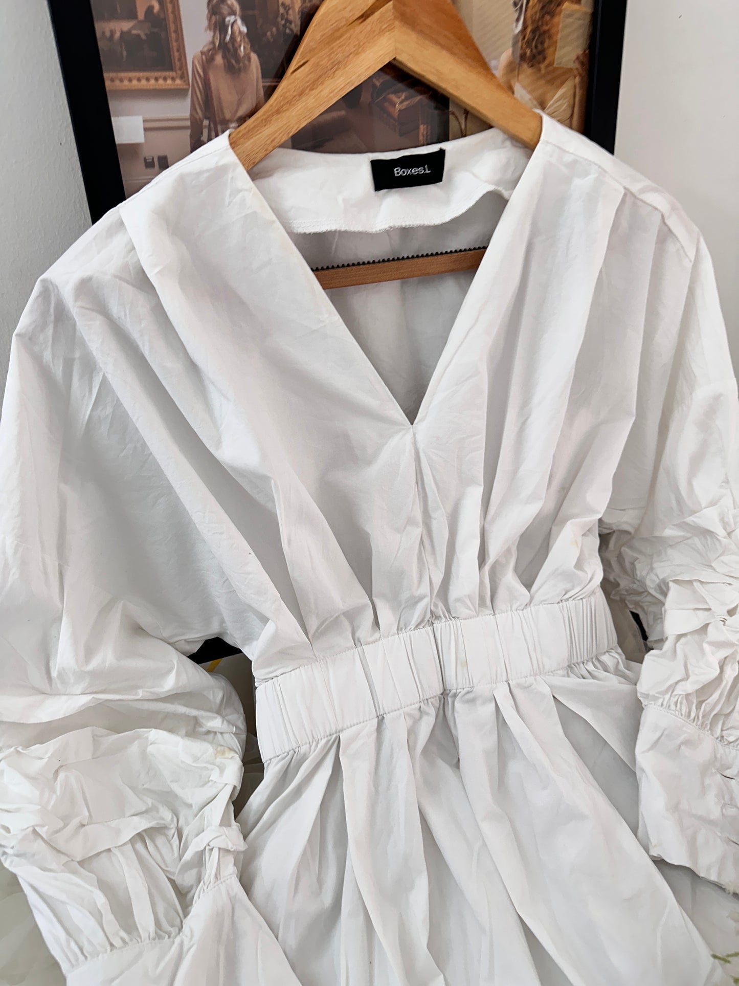 White cinched waist top
